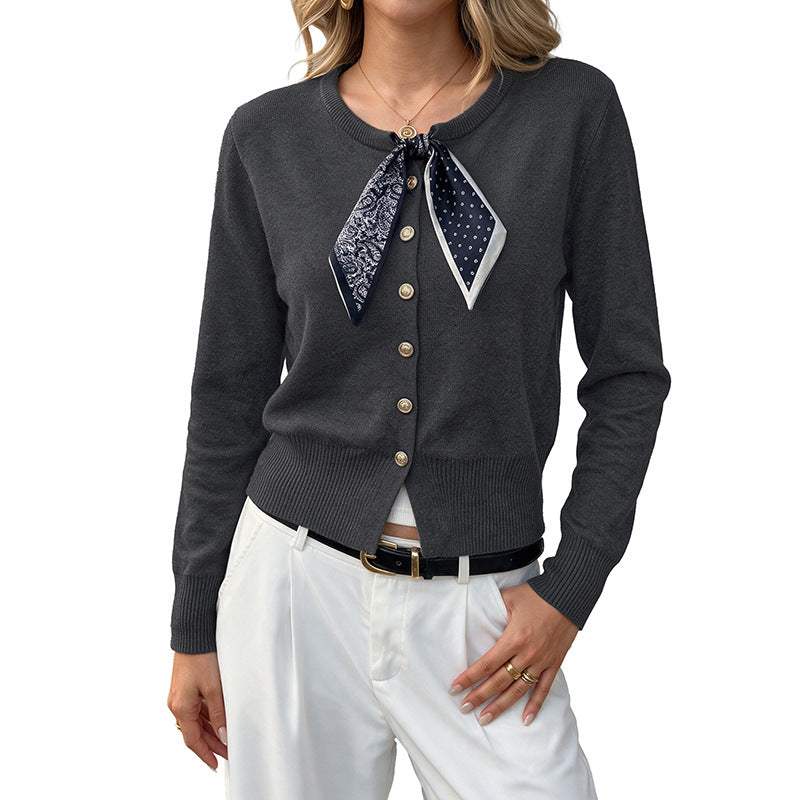 Round neck cardigan paired with scarf sweater
